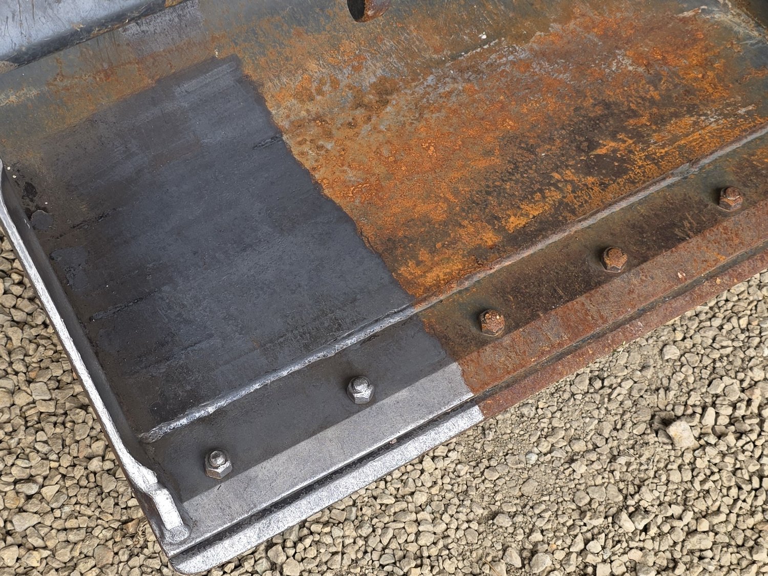 Industrial metal plate before and after laser cleaning